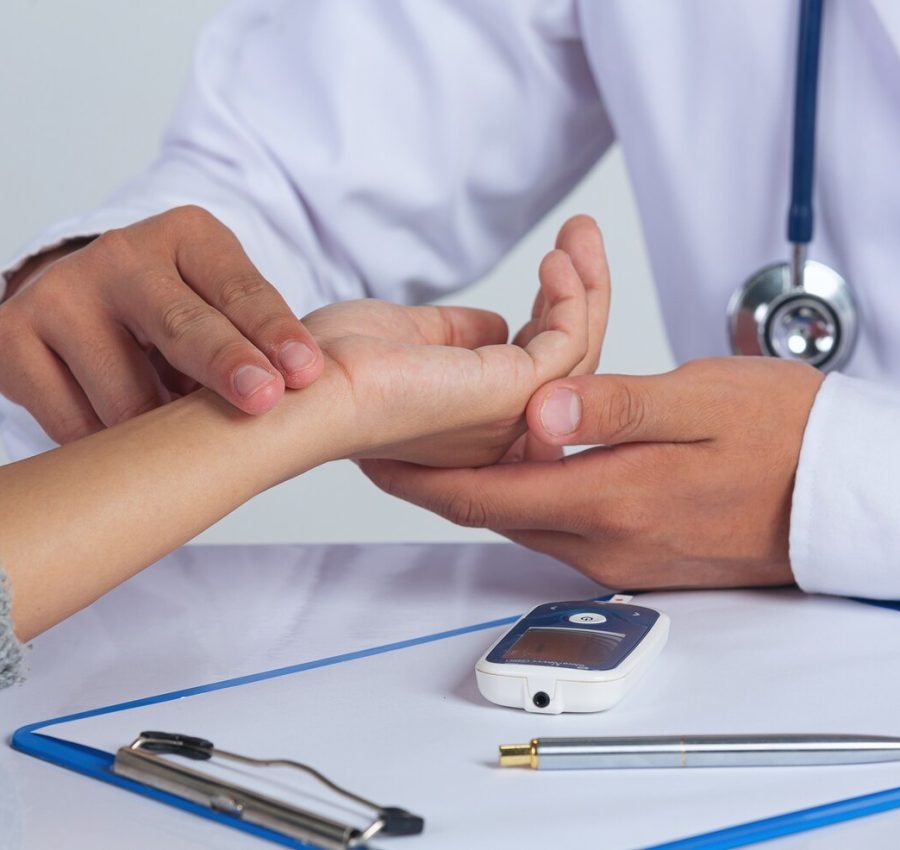 world-diabetes-day-docter-checking-patient-pulse-s_1150-26699